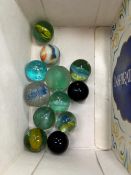 A SMALL COLLECTION OF ANTIQUE MARBLES.