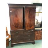 A LATE GEORGIAN INLAID MAHOGANY PRESS CABINET. TWO DOOR HANGING SPACE ABOVE DRAWERS. W 134 H 214cms