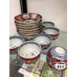 SIX JAPANESE IMARI BOWLS, SIX OCTAGONAL DISHES AND A BOWL