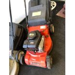 A SOVEREIGN LAWN MOWER WITH BRIGGS AND STRATTON ENGINE