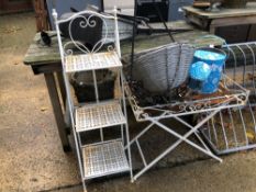 TWO WROUGHT IRON STANDS, FLOWER HANGING BASKETS AND A WATERING CAN