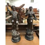 A PAIR OF SPELTER FIGURES, THE BASES LABELLED COD AND SHRIMP FISHING RESPECTIVELY