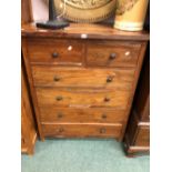 A HARDWOOD TALL CHEST AND MATCHING HANGING CUPBOARD (2)