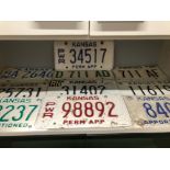 TEN VARIOUS KANSAS STATE VEHICLE LICENSE PLATES.