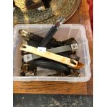 A COLLECTION OF SUITCASE HANDLES AND HINGES