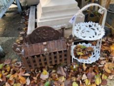 A SMALL PAINTED CAST IRON TWO TIER STAND TOGETHER WITH A SMALL CAST IRON FIRE BASKET