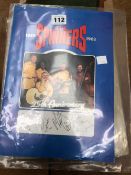 A SIGNED 25TH ANNIVERSARY BOOKLET FROM THE SPINNERS, A RUBAIYAT OF OMAR KHAYAM AND QUEEN