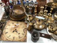 BRASS: CANDLESTICKS, BOWLS, VASES AND A KETTLE TOGETHER WITH A CLOCK FACE AND MISCELLANEOUS