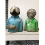 A PAIR OF FIBREGLASS BUSTS OF A MAN AND WOMAN