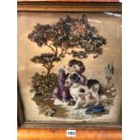 A VICTORIAN NEEDLEWORK PANEL OF A GIRL WITH HER PET DOG IN A MAPLE FRAME, TOGETHER WITH A