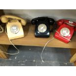 THREE PLASTIC TELEPHONES