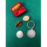 AN AMBER CHEROOT IN CASE, A 1937 CORONATION MEDALLION, A 5 FRANCS 1811 KEYRING, A VINTAGE BROOCH,