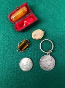 AN AMBER CHEROOT IN CASE, A 1937 CORONATION MEDALLION, A 5 FRANCS 1811 KEYRING, A VINTAGE BROOCH,