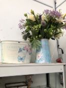 A FLORAL DECORATED METAL JUG AND TWO HANDLED BOWL