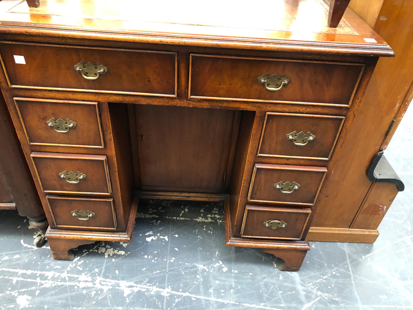 A 19th C. MAHOGANY KNEEHOLE DESK, THE LEATHER INSET TOP OVER TWO APRON DRAWERS AND THREE TO EACH