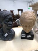 A WAX COMPOSITION HEAD OF A BOY TOGETHER WITH BUST OF A BLACK LADY