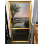 AN ANTIQUE FRENCH GILT TRUMEAU MIRROR. MIRROR PLATE SURMOUNTED BY HUNTING SCENES. H 161 W 77cms