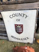 A PAINTED CAST ALLOY COUNTRY OF MIDDLESEX WALL PLAQUE