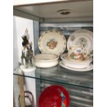 DOULTON BUNNIKINS WARES TOGETHER WITH A HUTSCHENREUTER PORCELAIN GROUP OF FOUR NOISY ANIMALS
