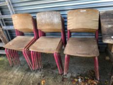 A SET OF EIGHTEEN VINTAGE STACKING CHAIRS