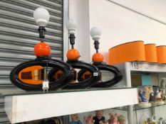 THREE RETRO ORANGE AND BLACK TABLE LAMPS WITH SHADES