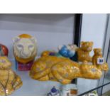 A SMALL COLLECTION OF SOUTH AFRICAN POTTERY LION FIGURES, ONE SIGNED CHANTHAL.