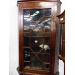 A GEORGE III MAHOGANY GLAZED CORNER CABINET H 106 W 70 D 43cms