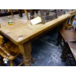 A PINE KITCHEN TABLE . H 79 W 137 D 91cms