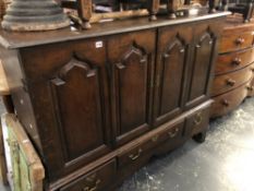 A 18th AND LATER ADAPTED OAK SIDE CABINET. H 113 W 114 D 53cms
