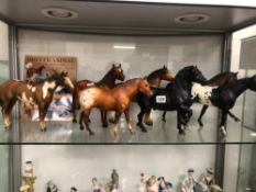 SEVEN BREYER HORSES TOGETHER WITH A BREYER COLLECTORS GUIDE