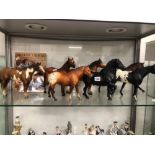 SEVEN BREYER HORSES TOGETHER WITH A BREYER COLLECTORS GUIDE