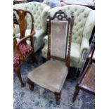 A LATE VICTORIAN NURSING CHAIR