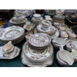 A LARGE QUANTITY OF AYNSLEY AND OTHER INDIAN TREE PATTERN DINNER WARES.