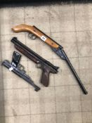 A CROSSMAN PUMP ACTION AIR PISTOL AND TWO OTHERS.