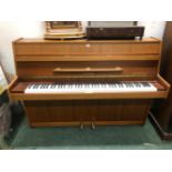 A GOOD QUALITY MODERN UPRIGHT PIANO. H 108 W 146 D 54cms