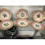 A 19th CENTURY PART DESSERT SERVICE WITH PINK RIMS ENCLOSING PAINTED FLOWER STEMS
