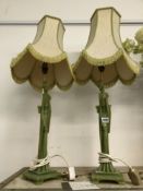 A PAIR OF GREEN COMPOSITION TABLE LAMPS MODELLED AS TALL ORIENTAL LADIES