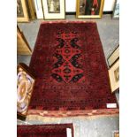 AN AFGHAN BELOUCH RUG. 200 x 127cms