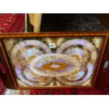 A VINTAGE BUTTERFLY WING DECORATED TWIN HANDLED TRAY TOGETHER WITH TWO NAIVE PICTURES OF VILLAGE