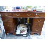 A ANTIQUE MAHOGANY TWIN PEDESTAL WRITING DESK WITH LEATHER INSERT.