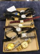 A COLLECTION OF TWELVE VARIOUS LADIES AND GENTS FASHION WRIST WATCHES.
