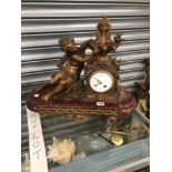 A LATE 19th CENTURY CLOCK SURMOUNTED BY A FOUNTAIN WITH A SPELTER LADY TO ONE SIDE SEATED ABOVE