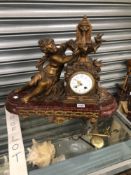 A LATE 19th CENTURY CLOCK SURMOUNTED BY A FOUNTAIN WITH A SPELTER LADY TO ONE SIDE SEATED ABOVE
