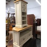 A PAINTED TV STAND AND A PAINTED CABINET