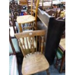 A SMALL OPEN BOOKCASE, A RUSH SET ARMCHAIR, A LOOM OTTOMAN AND A KITCHEN CHAIR