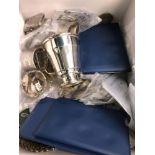 THREE HALLMARKED SILVER NAPKIN RINGS, THREE ANTIQUE VESTA CASES, A PLATED CHRISTENING CUP, THREE