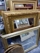 AN IMPRESSIVE VICTORIAN GILT FRAME BEVELLED MIRROR. 120 x 100cms TOGETHER WITH A PAIR OF LARGE