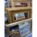 AN IMPRESSIVE VICTORIAN GILT FRAME BEVELLED MIRROR. 120 x 100cms TOGETHER WITH A PAIR OF LARGE