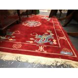 A GOOD QUALITY CHINESE RUG OF DRAGON DESIGN. 254 x 166cms