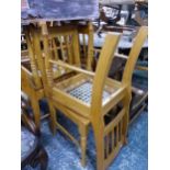 A SET OF EIGHT AFRICAN HARDWOOD DINING CHAIRS